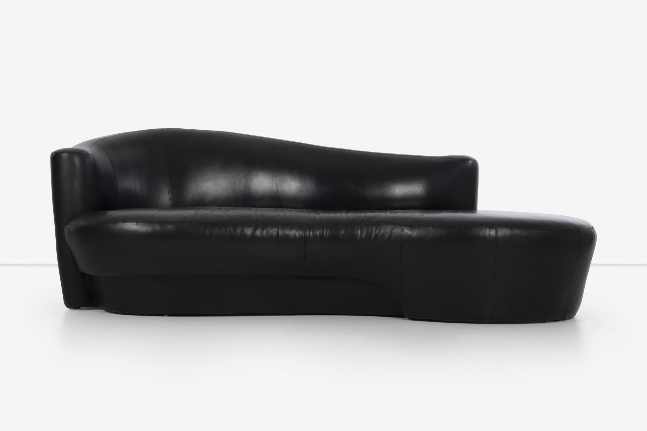Pair of Weiman black leather sofas. Label underside Weiman. 