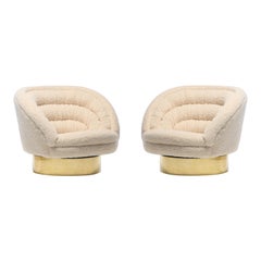 Pair of Vladimir Kagan Crescent Swivel Chairs in Ivory Bouclé with Brass Bases