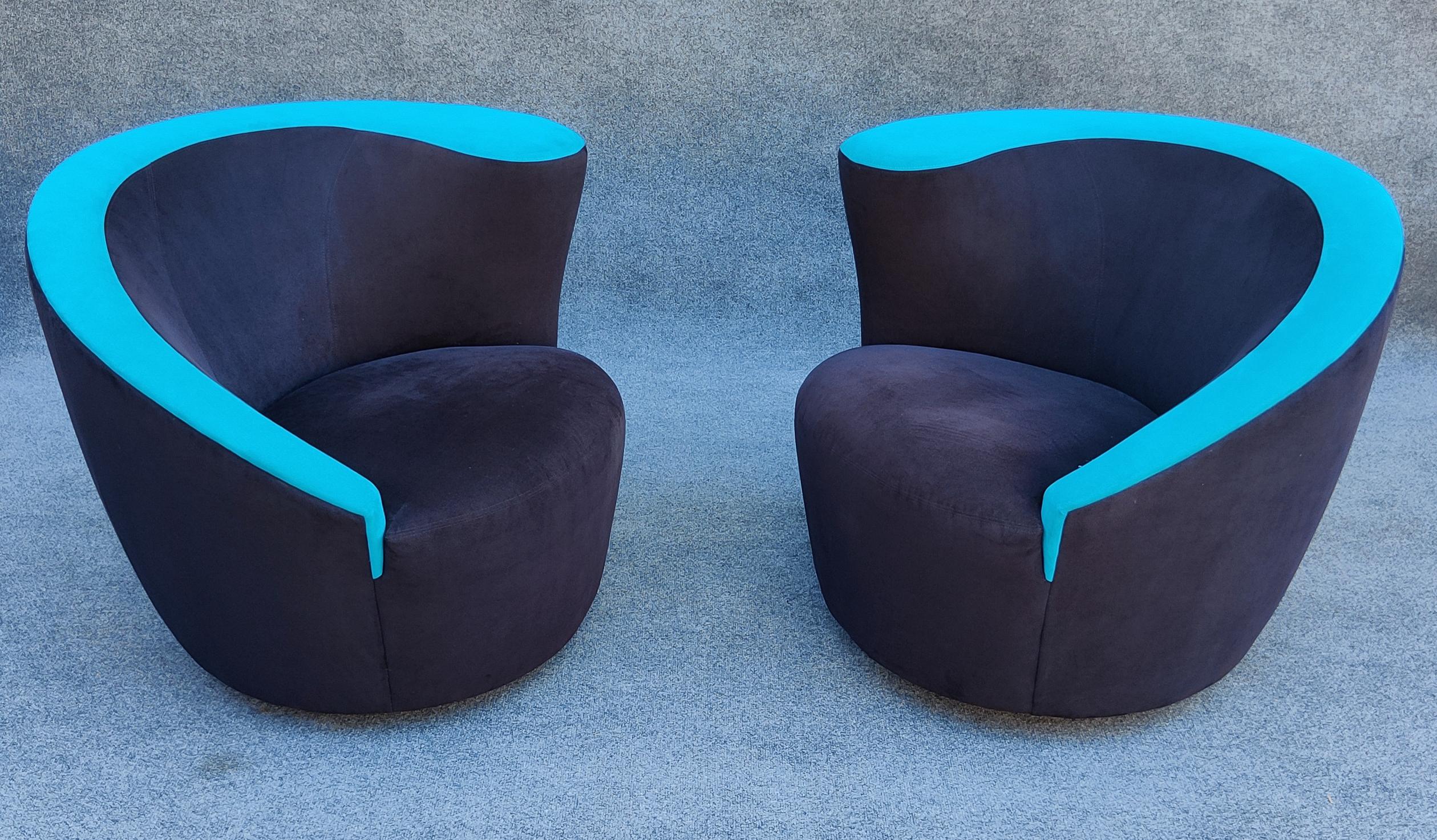 Designed by Vladimir Kagan for prestigious manufacturer Directional, this symmetrical (left and right) pair of chairs are rare and exclusive. Their distinct and organic design features a curved, shell-like shape made of suede upholstery over a