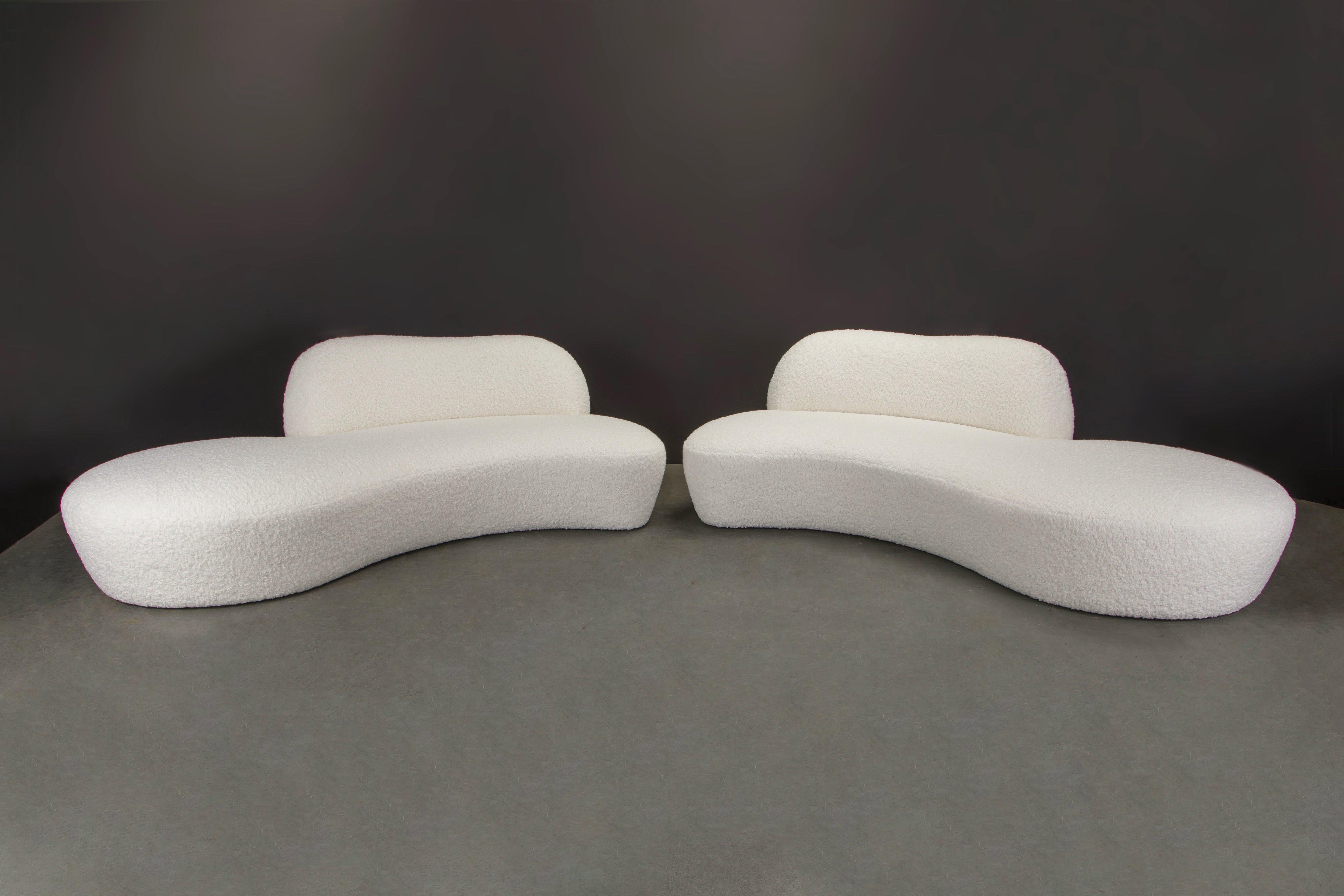 This spectacular pair of Vladimir Kagan 'Zoe' sofas were produced by American Leather for a short time, circa early 2000's, and was just reupholstered in a gorgeous white bouclé fabric (brand new fabric), signed underneath with American Leather