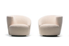 Pair of Vladimir Kagan Nautilus Swivel Lounge Chairs and Ottoman in Ivory Bouclé