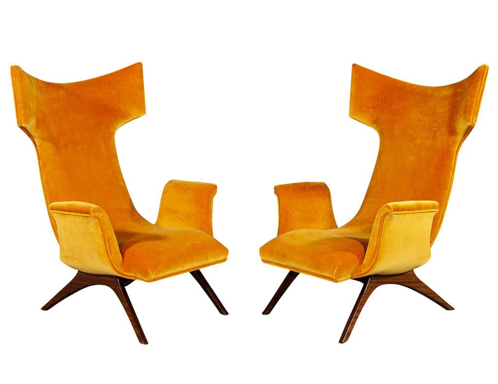 Pair of Vladimir Kagan Ondine wing chairs. Upholstered in a burnt orange velvet with sleek pedestal design.

Price includes complimentary curb side delivery to the continental USA.