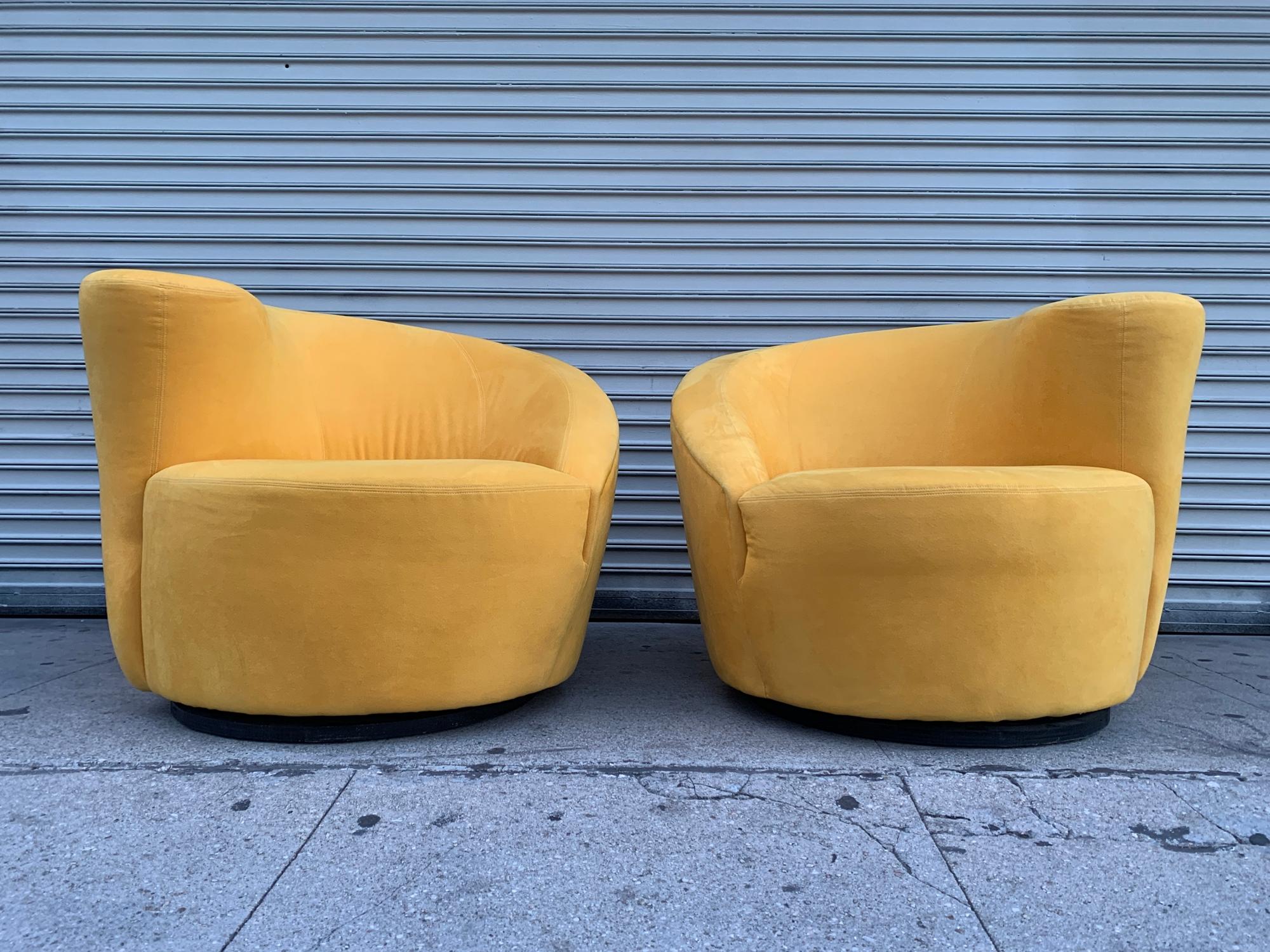 Vladimir Kagan designed Nautilus lounge chairs upholstered in a yellow microfiber fabric which matches the Vladimir Kagan Serpentine sofa we have listed (this was purchased as a set).
Both, the chairs and sofa are designed by Vladimir Kagan and