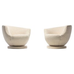 Pair of Vladimir Kagan Swivel Chairs in Ivory Bouclé by Directional