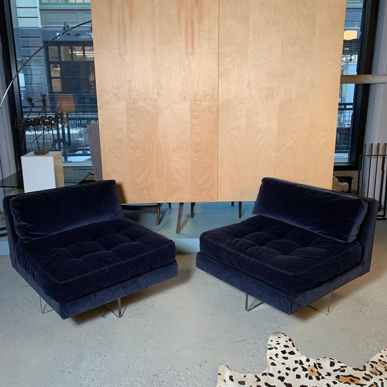 Pair of outstanding, blue velvet, slipper lounge chairs by Vladimir Kagan circa 1970s feature return swivel, clear Lucite X bases.