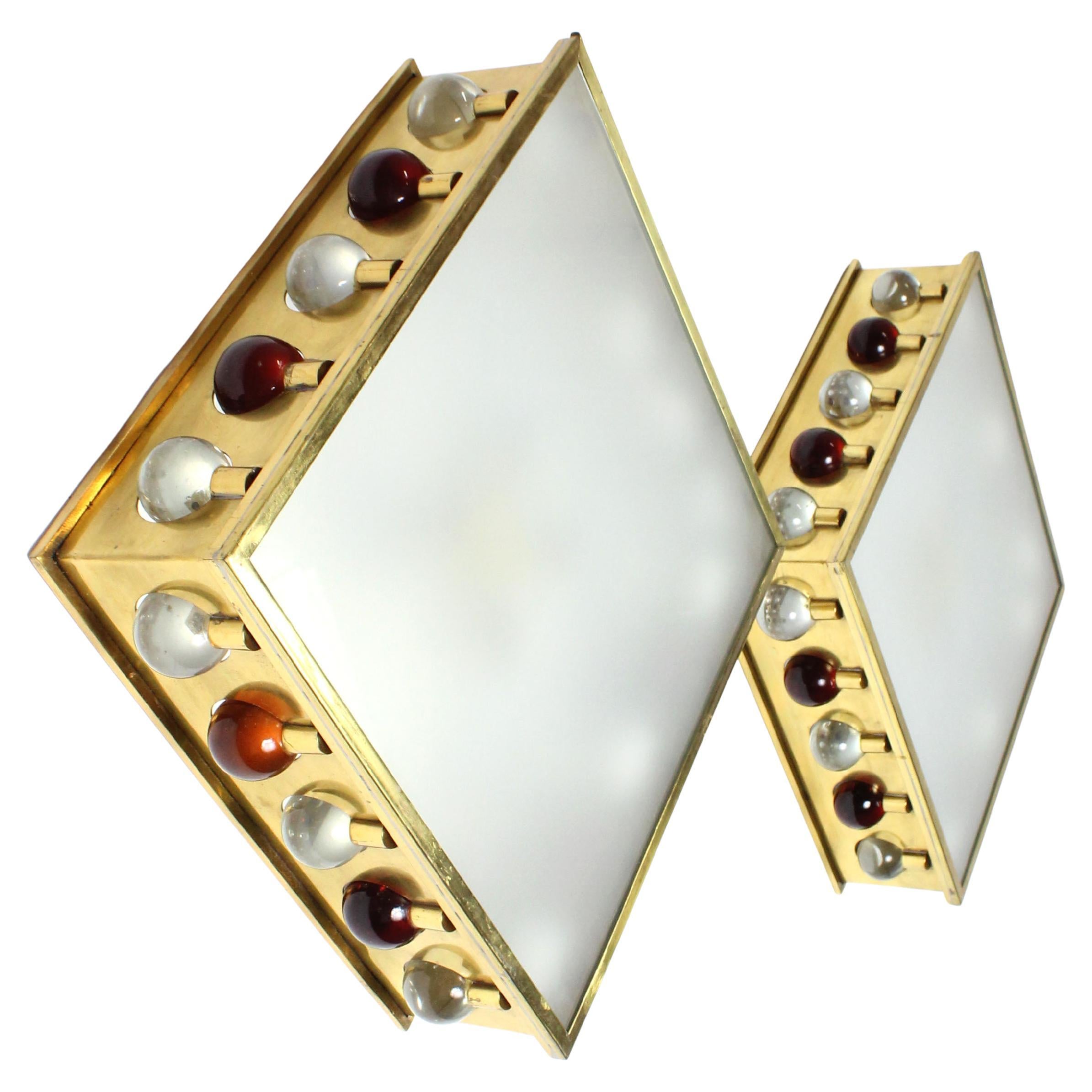 Pair of wall/ceiling lights with gilt brass frames and amber and clear glass For Sale