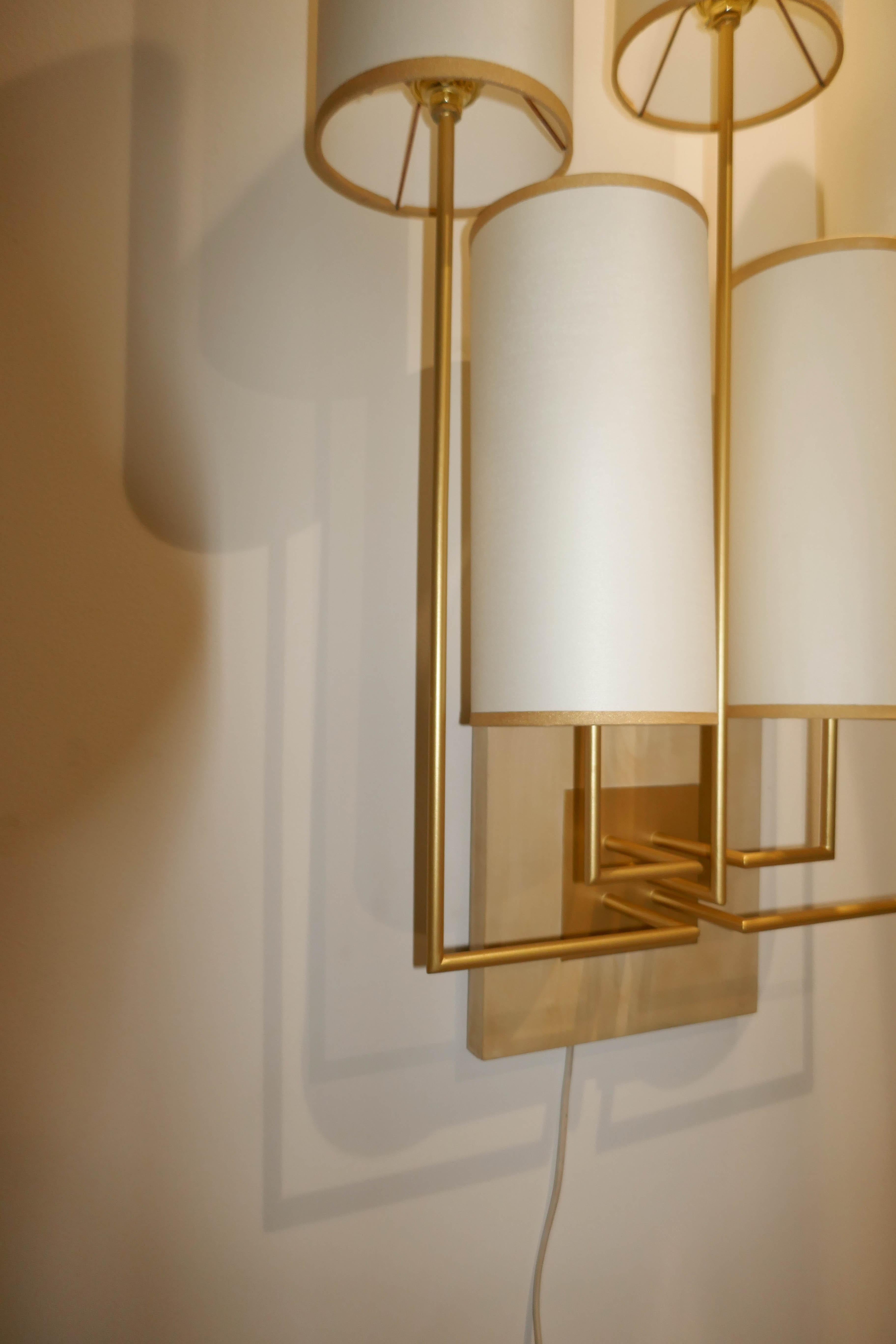 Metal Pair of Wall Lamp Sconce in Gold Patina and White Fabric Lamp Shades For Sale