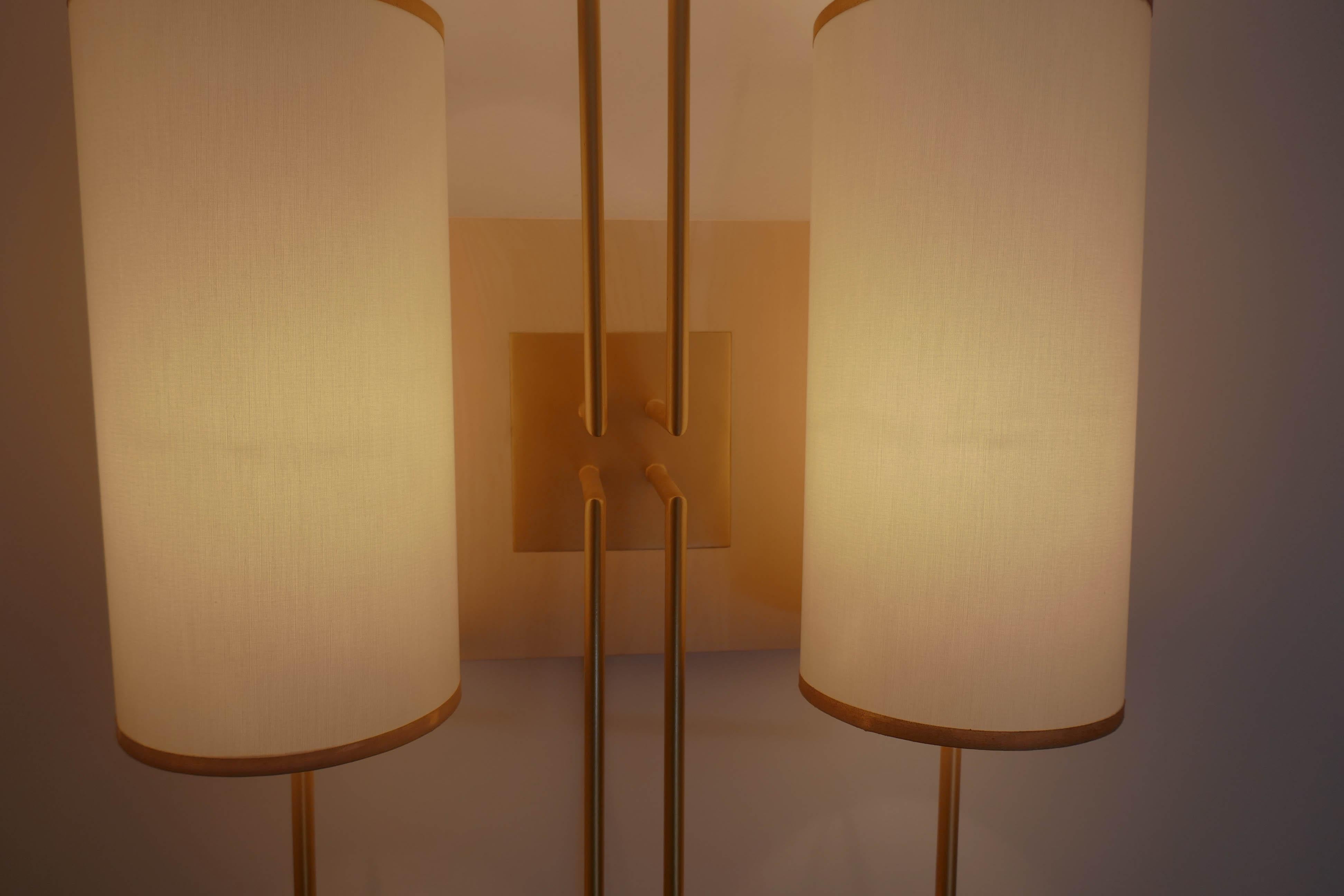 Contemporary Pair of Wall Lamp Sconce in Gold Patina and White Lamp Shades For Sale