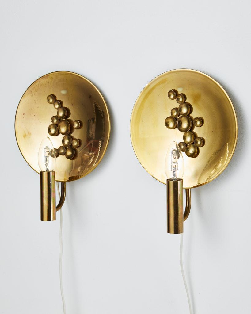 Pair of wall lamps, anonymous, for TM Insjön,
Sweden. 1960s.

Brass.

Dimensions: 
D: 22 cm/ 8 5/8