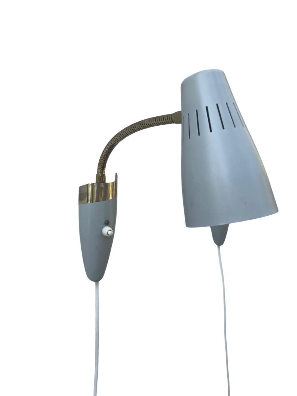 A pair of elegant Swedish wall lamps, model 