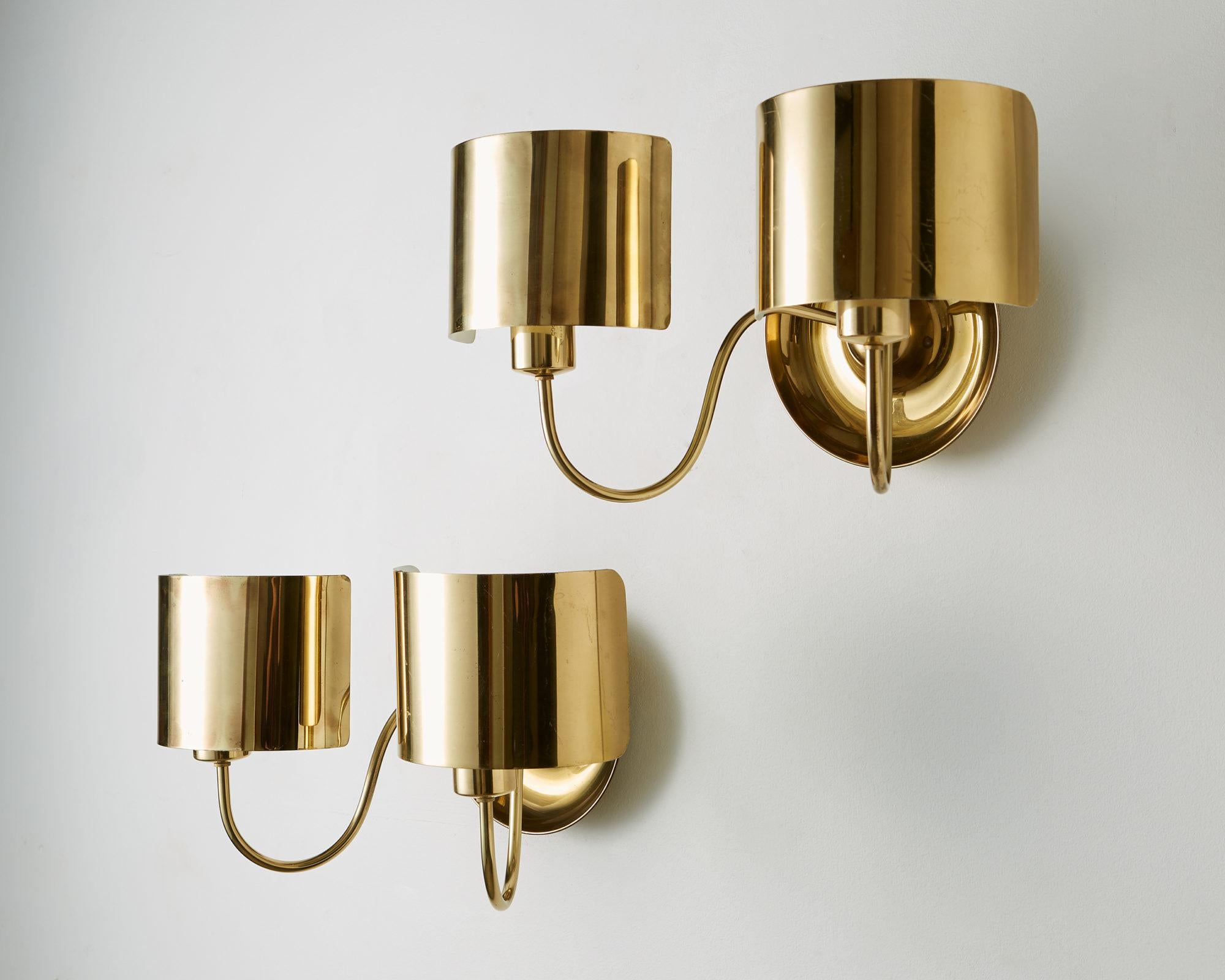 Pair of wall lamps designed by Josef Frank for Svenskt Tenn, Sweden, 1950s.
Brass.

Sold as a pair.