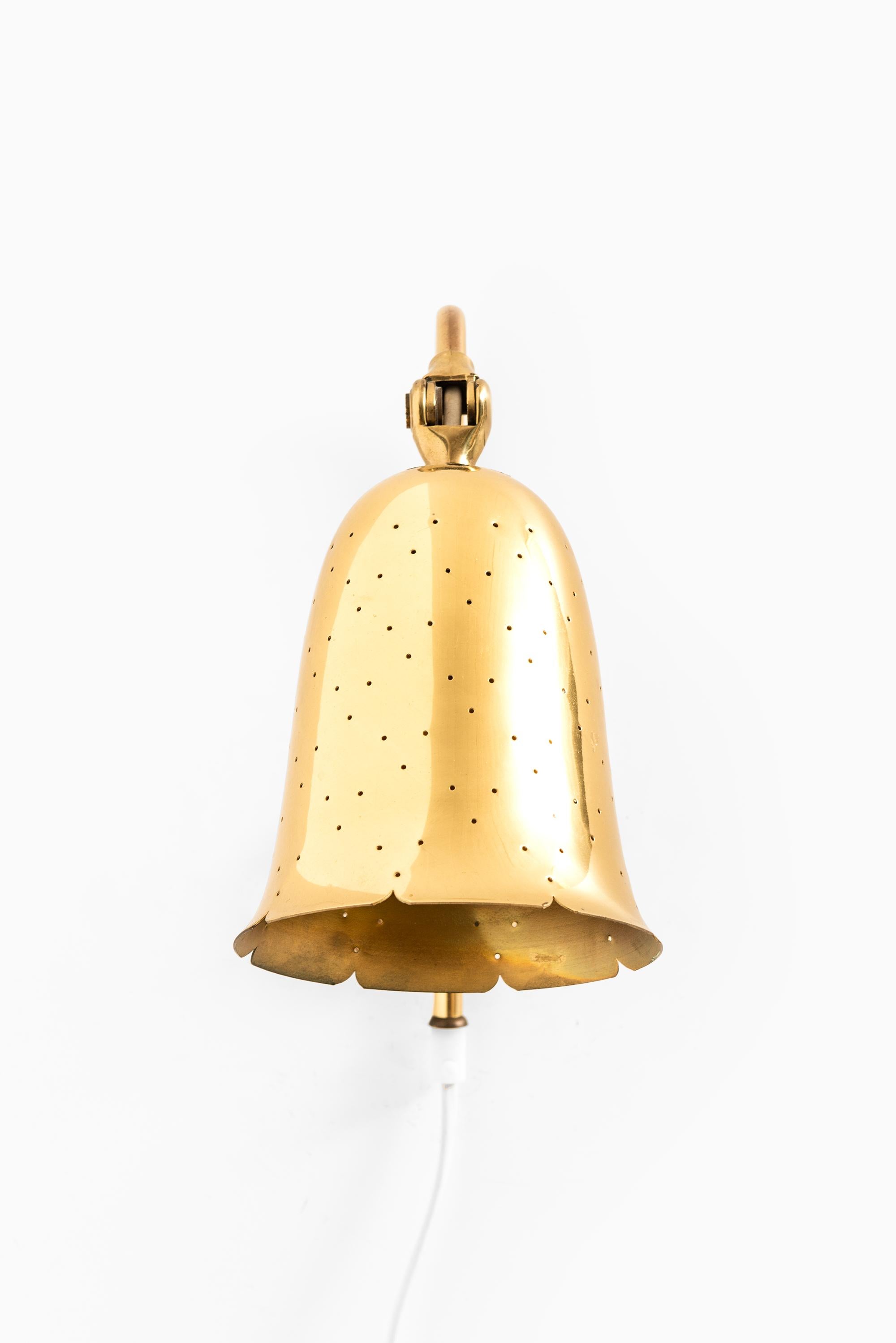 Rare wall lamps in brass. Produced by Boréns in Sweden.