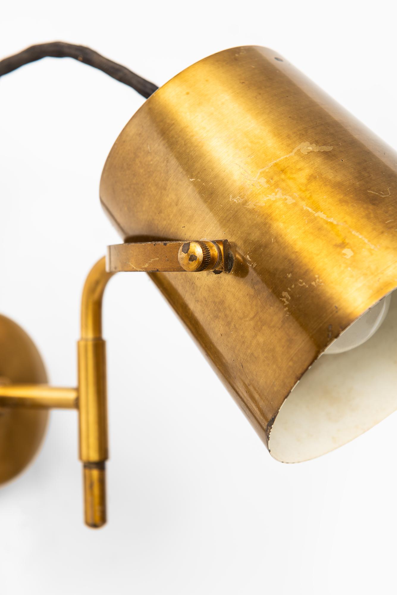 Pair of wall lamps in brass. Produced in Sweden.