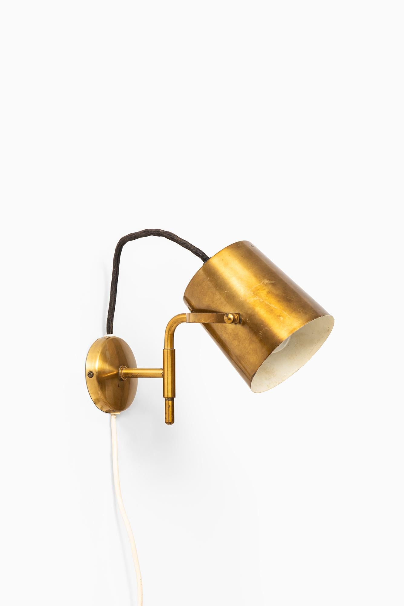 Swedish Pair of Wall Lamps in Brass Produced in Sweden