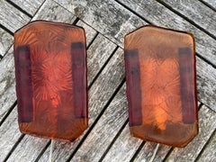 Pair of wall lamps in cast amber glass and brass. By Vitrika in Denmark 1970ties