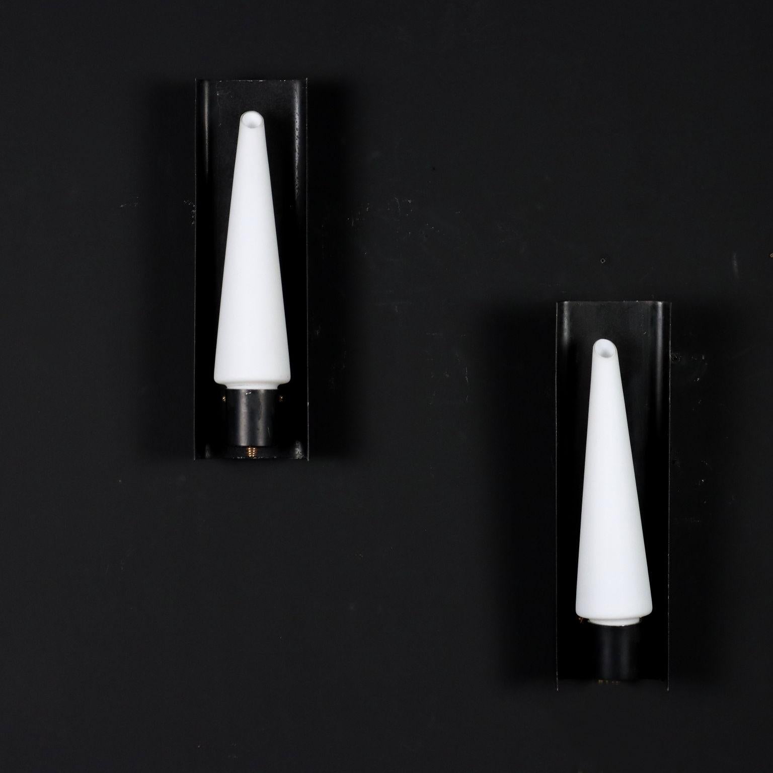 Pair of wall lamps in enameled metal with opaline glass diffuser.