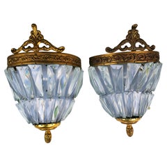 Pair of Empire-style wall lamps, possibly gilded bronze