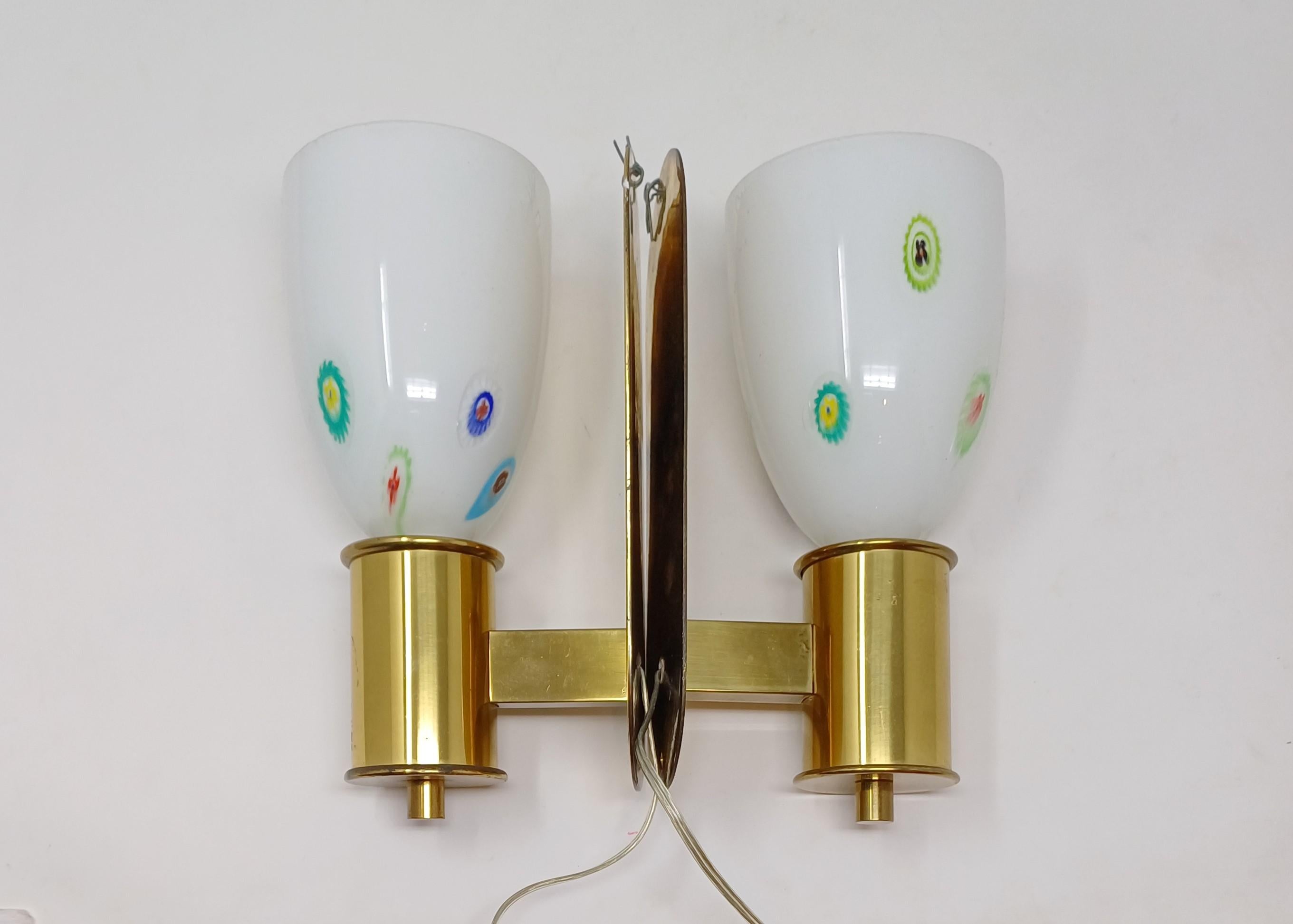 A pair of wall lights attributed by the famous Italian Architect Carlo Scarpa for M.V.M. Cappellin. Murano Italy ca. 1929 - 30. Murano glass mounted on brass holders.