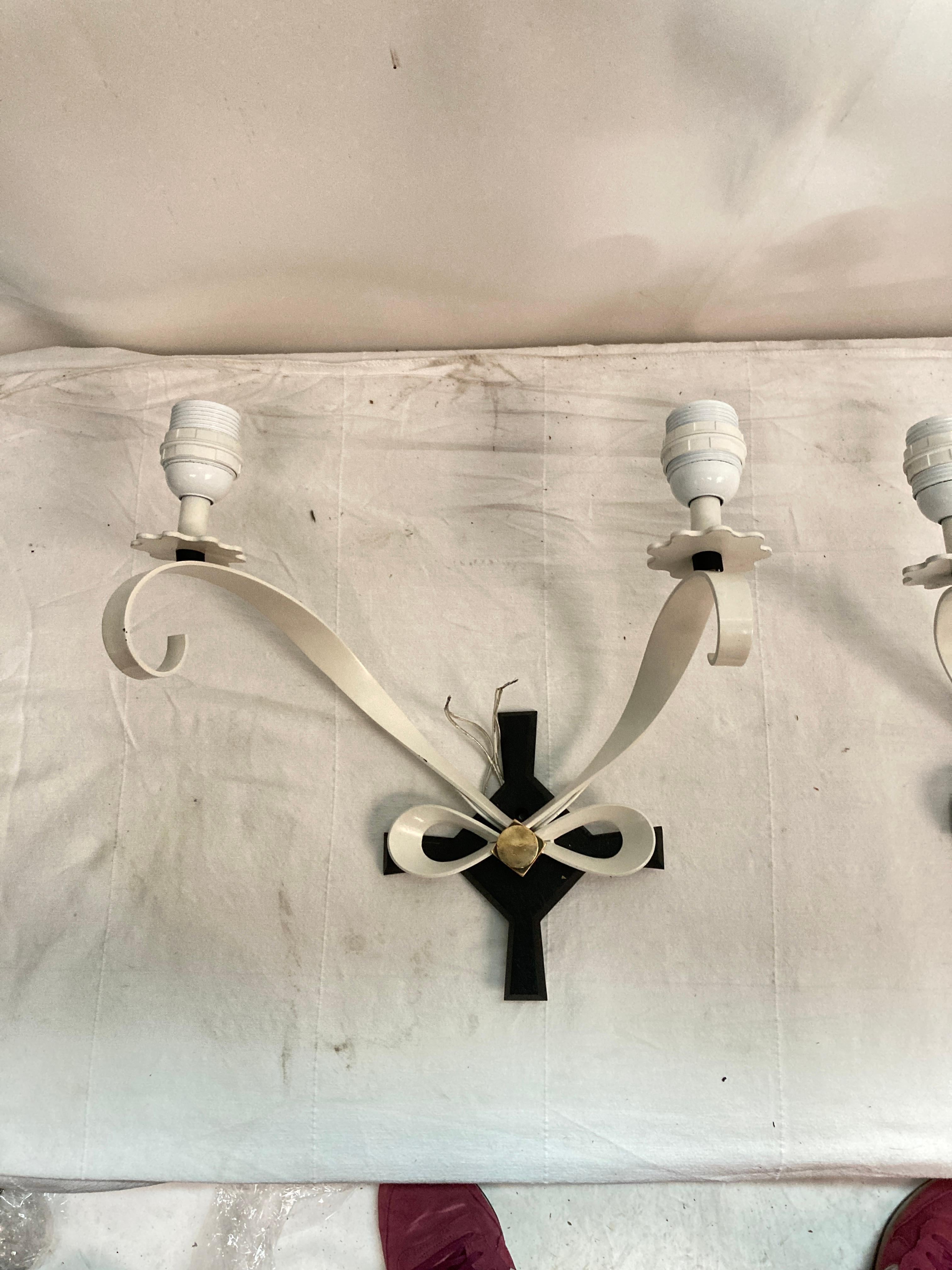 French Pair of wall lights by René Drouet For Sale