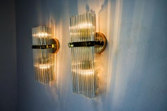 Pair of wall lights from the house of Sciolari for Lightolier, Italy 1970