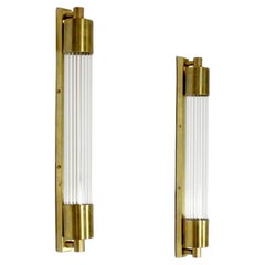 Pair of wall lights in fluted glass and gilt brass