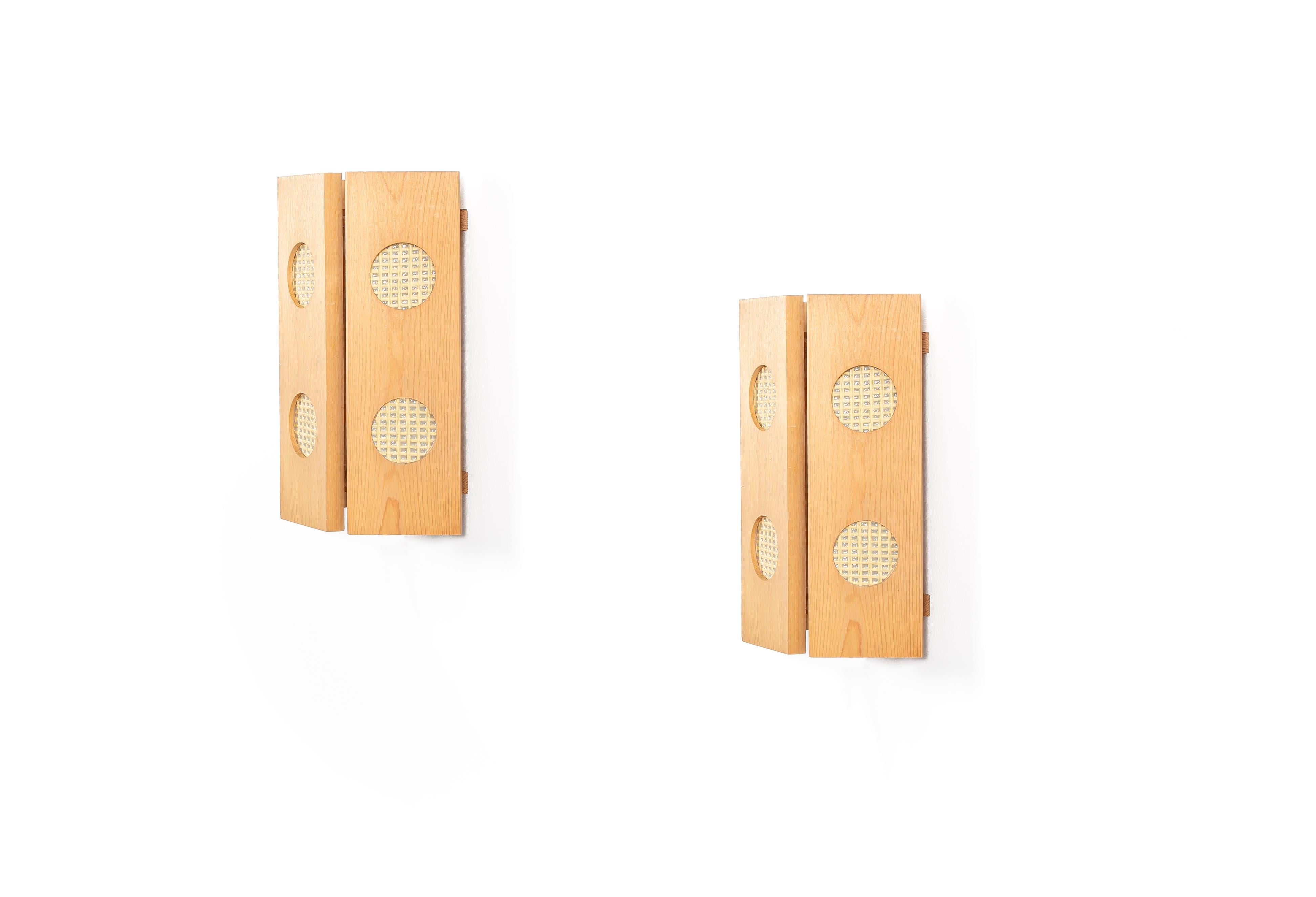 Sculptural wall lamps in pine. Designed and made in Norway from cirka 1960 second half. Both lamps are fully working and in good vintage condition. Each lamp is fitted with one E14 bulb holder (works in the US), with a max wattage of 60.