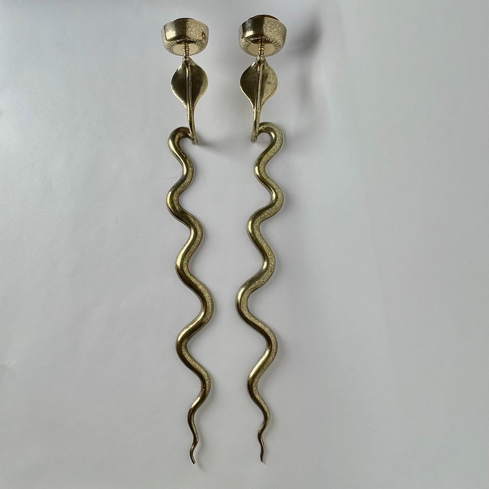 A large pair of Wall Lights in the shape of a Cobra. Art Deco, 1920s-1930s. Scary but cool. Elegantly decorated in brass.

Wear consistent with age and use.