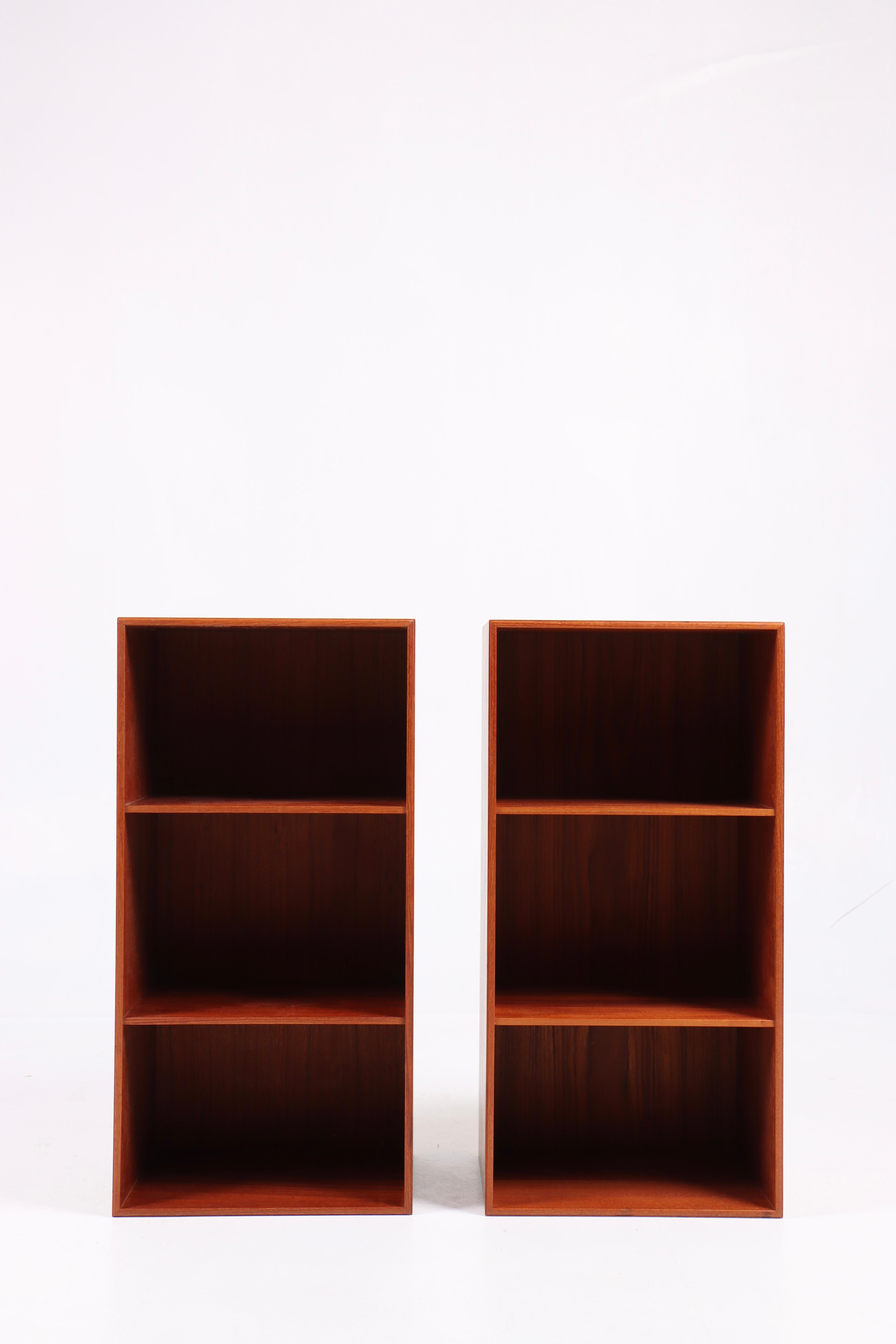 Pair of units in solid Teak. Designed by Mogens Koch for Rud. Rasmussen cabinetmakers in 1933. Made in Denmark. Great original condition.