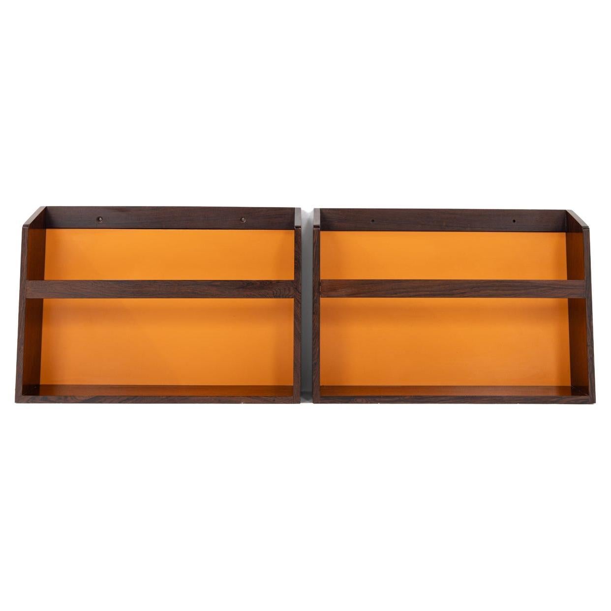 Pair of wall mounted magazinracks  attributed to Steffen Syrach Larsen For Sale
