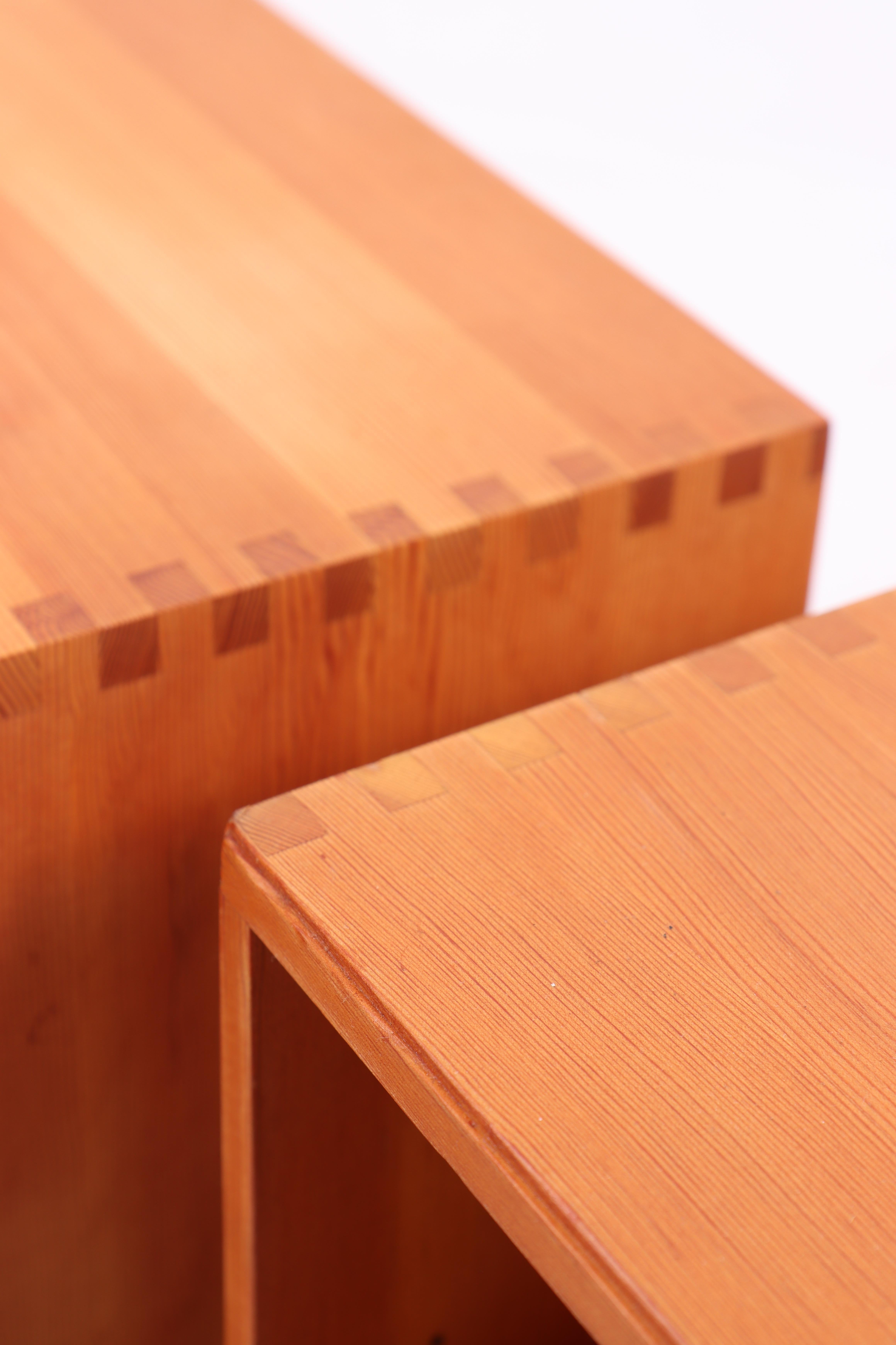 Pair of wall-mounted nightstand in solid pine, designed and made in Denmark 1970s. Great original condition.