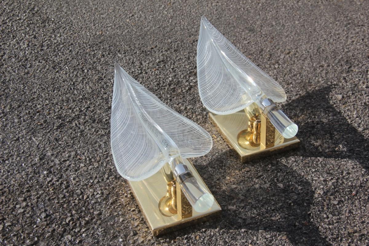 Pair of wall sconces leaves Franco Luce Design, 1970s Murano glass brass parts.
Bulbs E14 max 40 Watt.