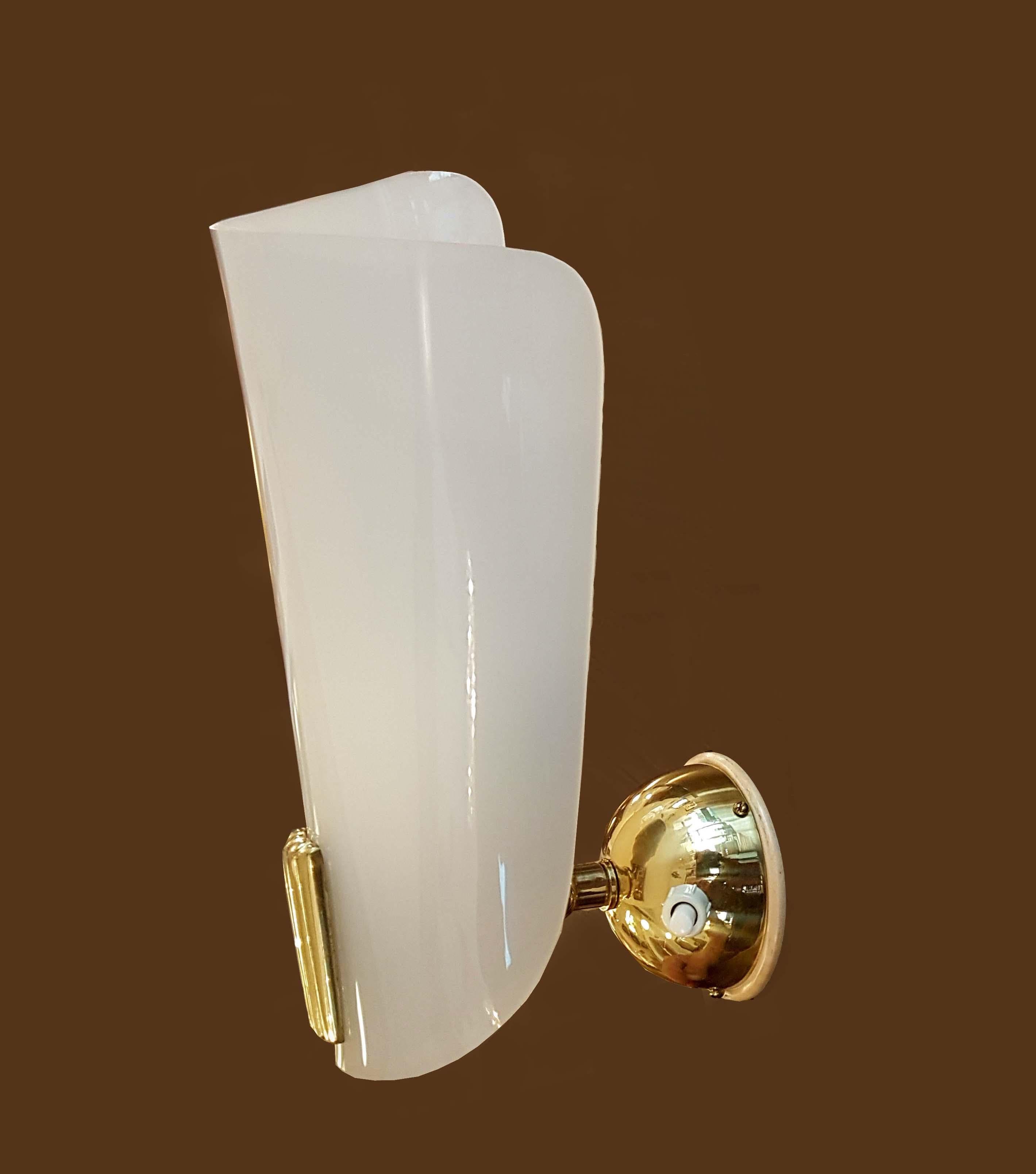 Pair of wall sconces,
designed Rupert Nikoll,
Vienna, 1950
brass with white Lucite shades.