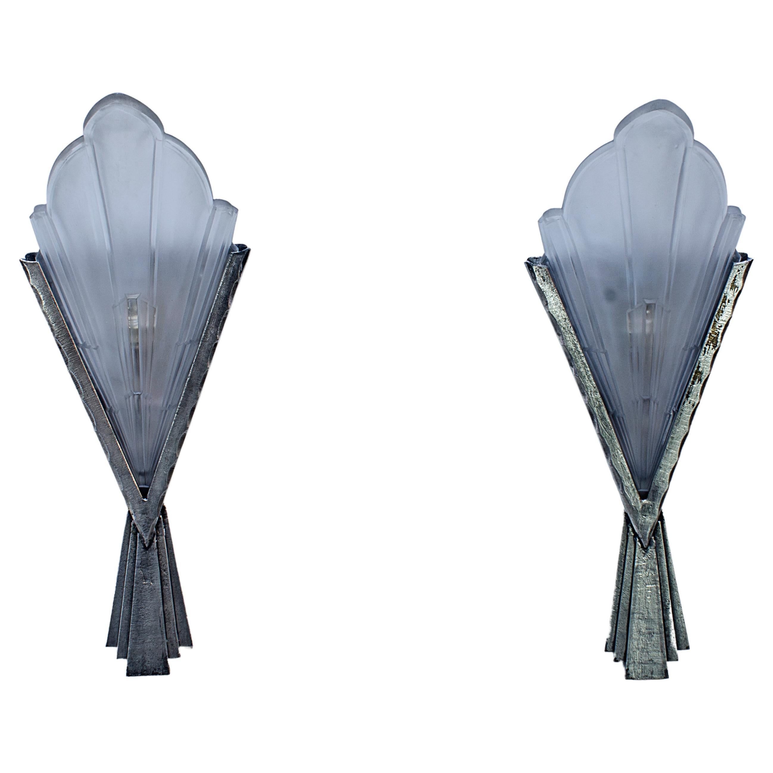 Pair of wall sconces with glass shade by EJG