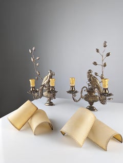 Pair of wall sconces with parrots and leaves by Maison Bagues.
