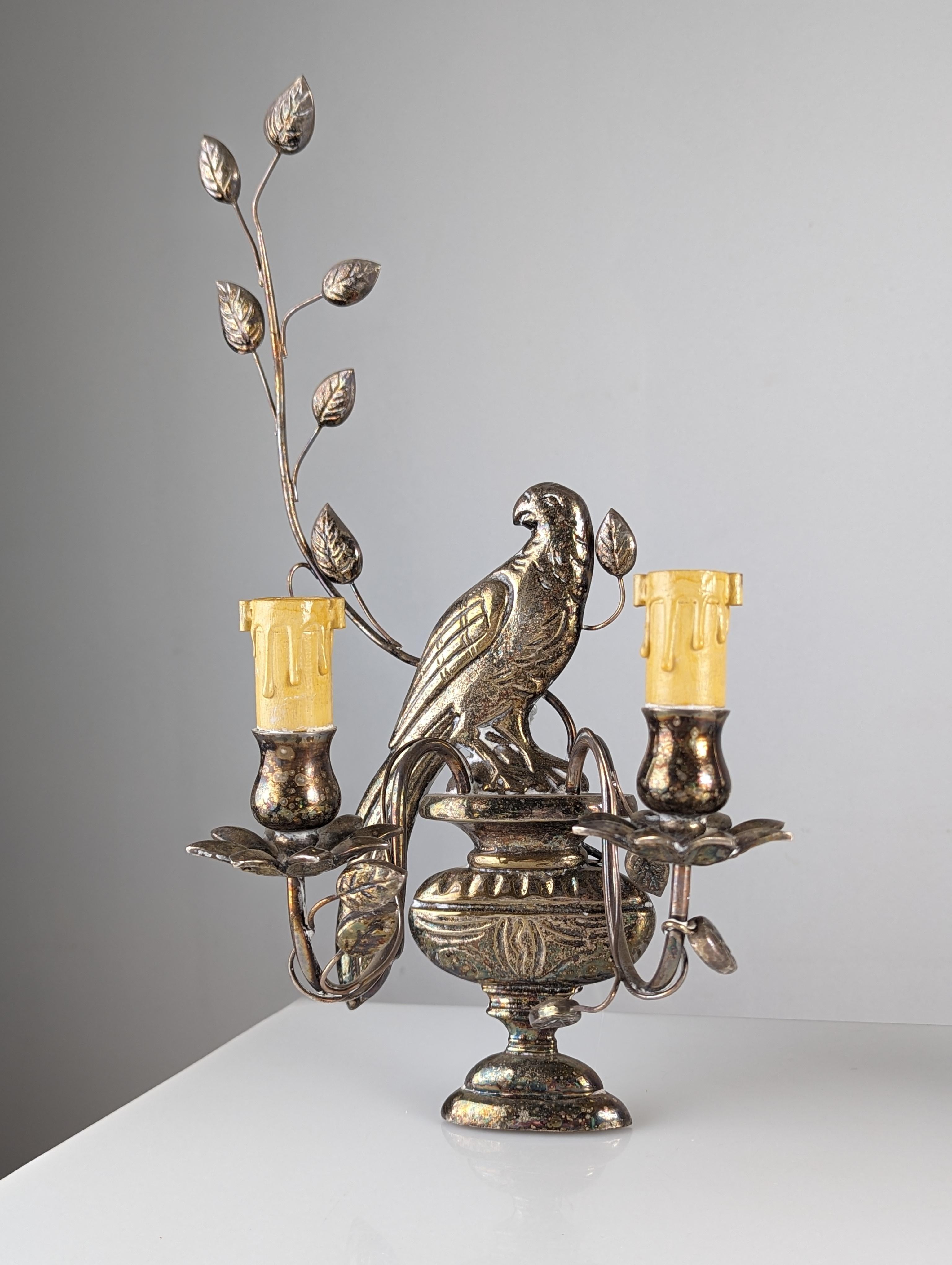French Pair of wall sconces with parrots and leaves by Maison Bagues. For Sale