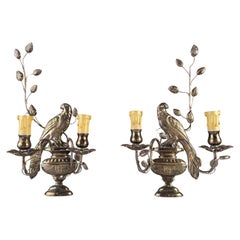 Pair of wall sconces with parrots and leaves by Maison Bagues.