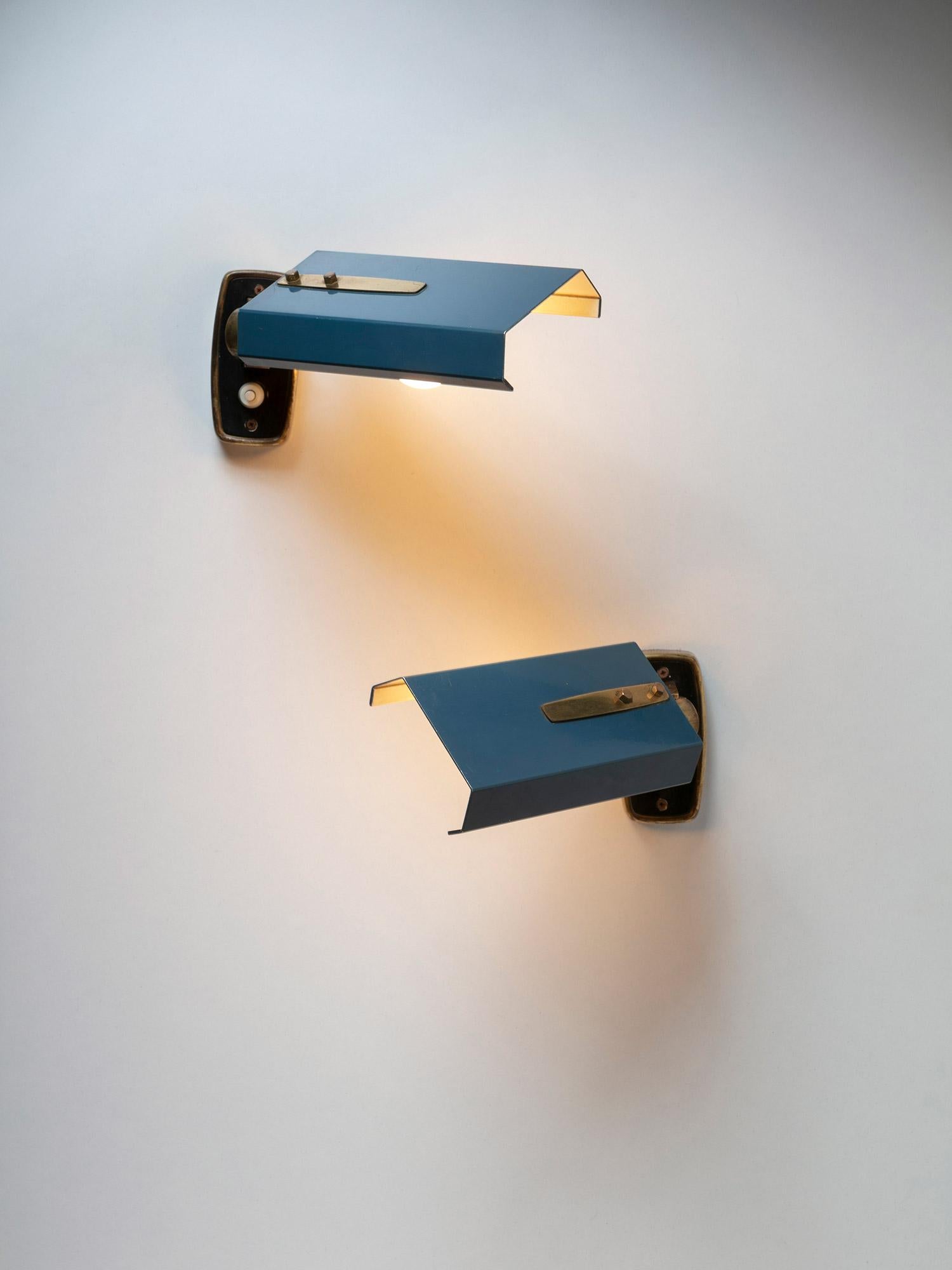 Set of two model 2133 wall spot lights by Stilnovo
Adjustable light blue shade with brass details.