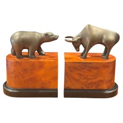 Coppia di fermalibri in ottone con orso e toro di Wall Street
