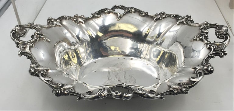 Lovely pair of sterling silver centerpieces / fruit-bowls, by Wallace, possibly in the Grande Baroque pattern. Measuring larger bowl 13 inches long, 10 inches wide, and 3.6 inches tall and smaller one 8.2 inches wide. Weighing together 31.7 troy