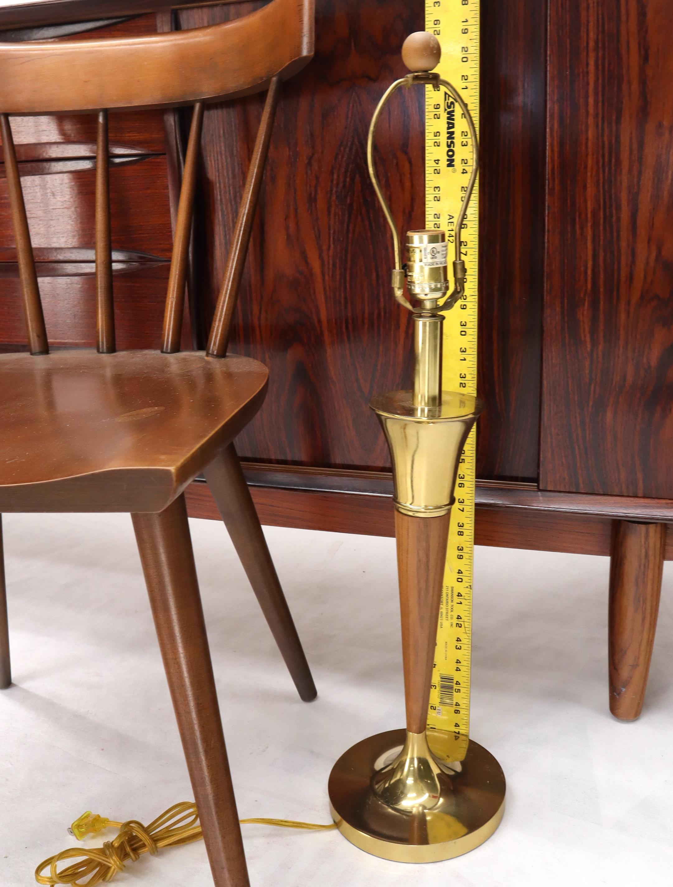 Pair of cone shape turned walnut and brass Mid-Century Modern table lamps.