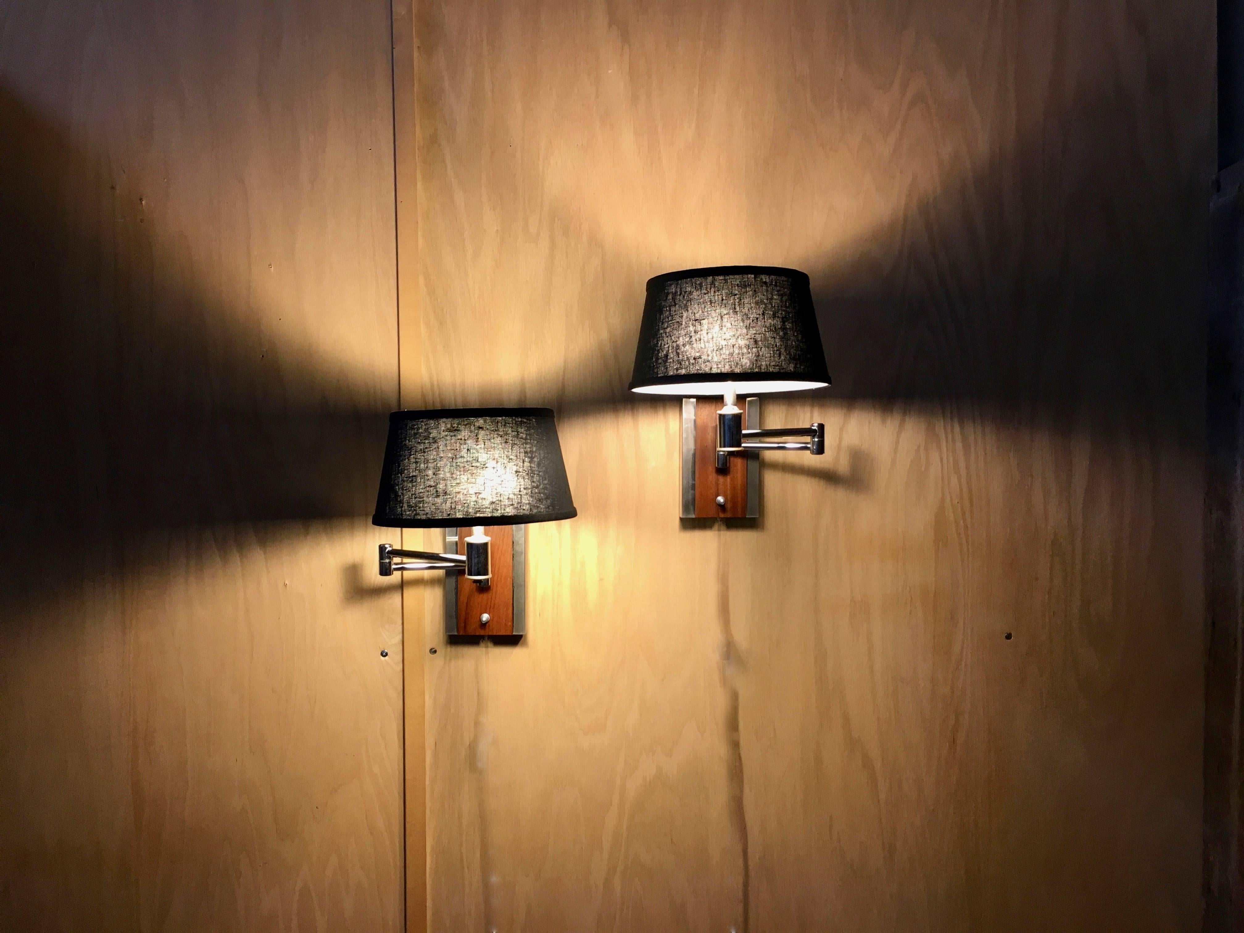 20th century sconces with solid walnut base and chrome arm and side accents and black linen shades