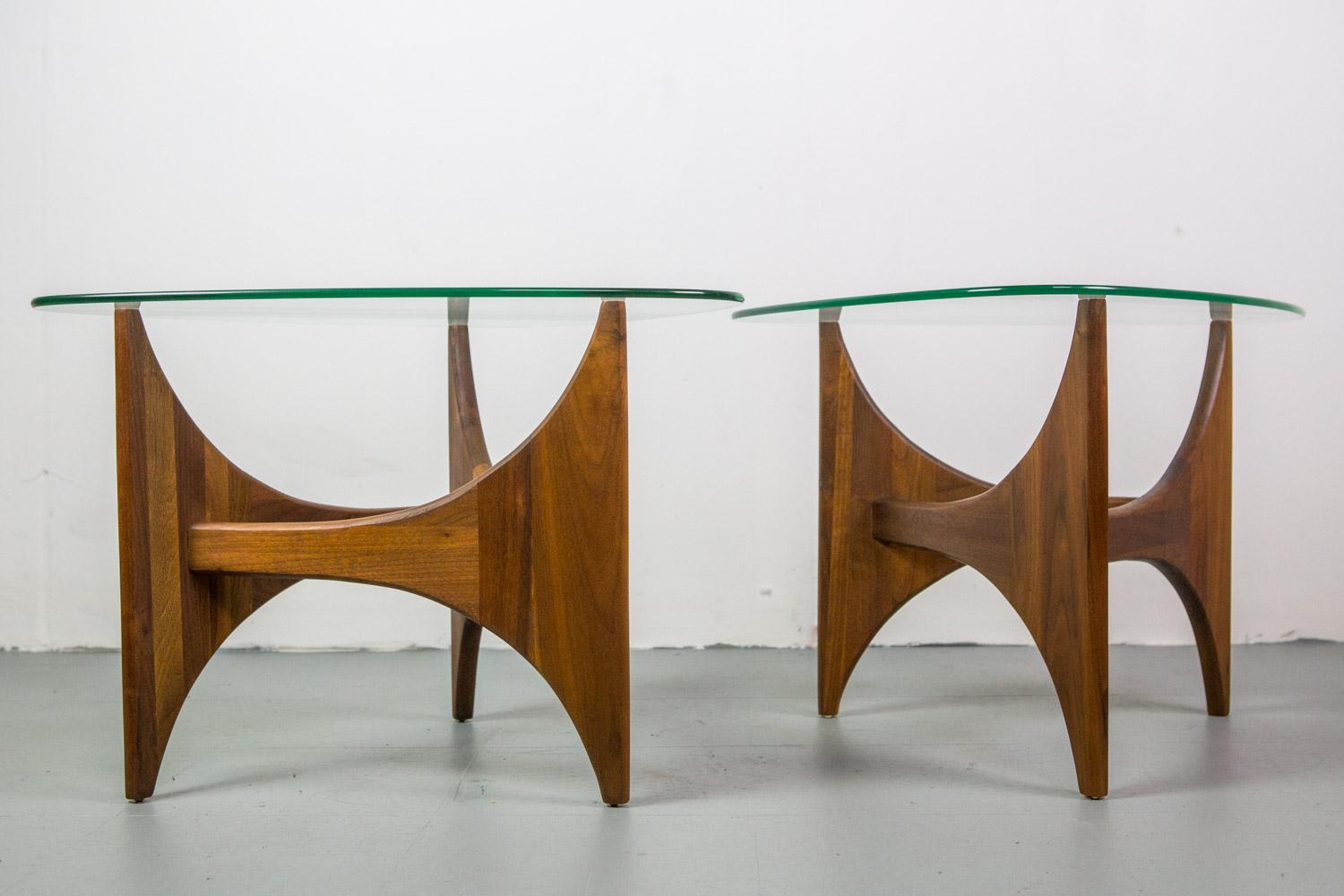 Pair of walnut and glass coffee tables designed by Adrian Pearsall for Craft Associates in american design.