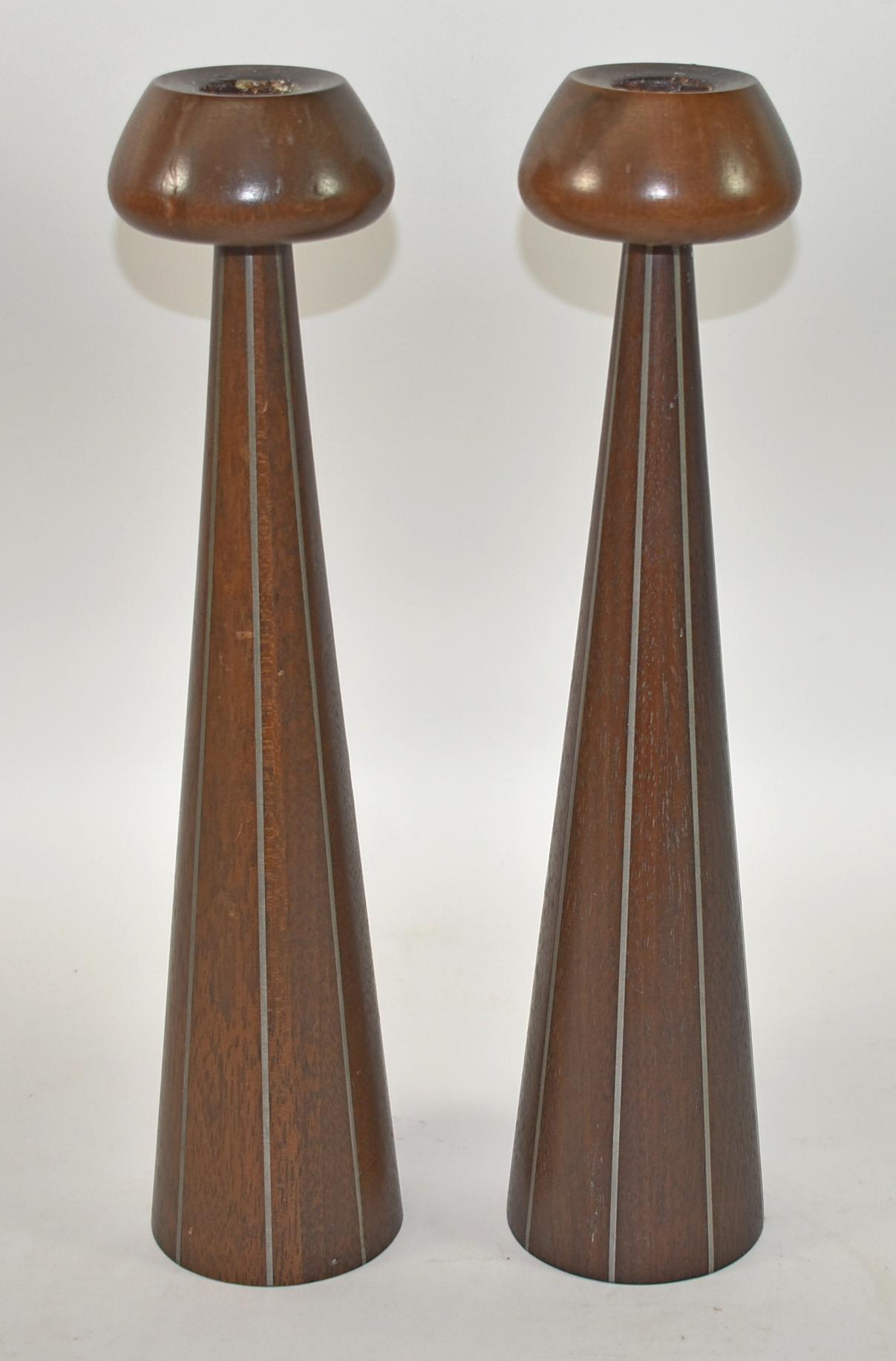 Pair of Walnut and Pewter Candlesticks by Paul Evans and Phillip Powell. circa 1950s. A design from Designer's Inc, an early collaboration between Paul Evans and Phillip Lloyd Powell in the 1950s where they had their studios and joined showroom in