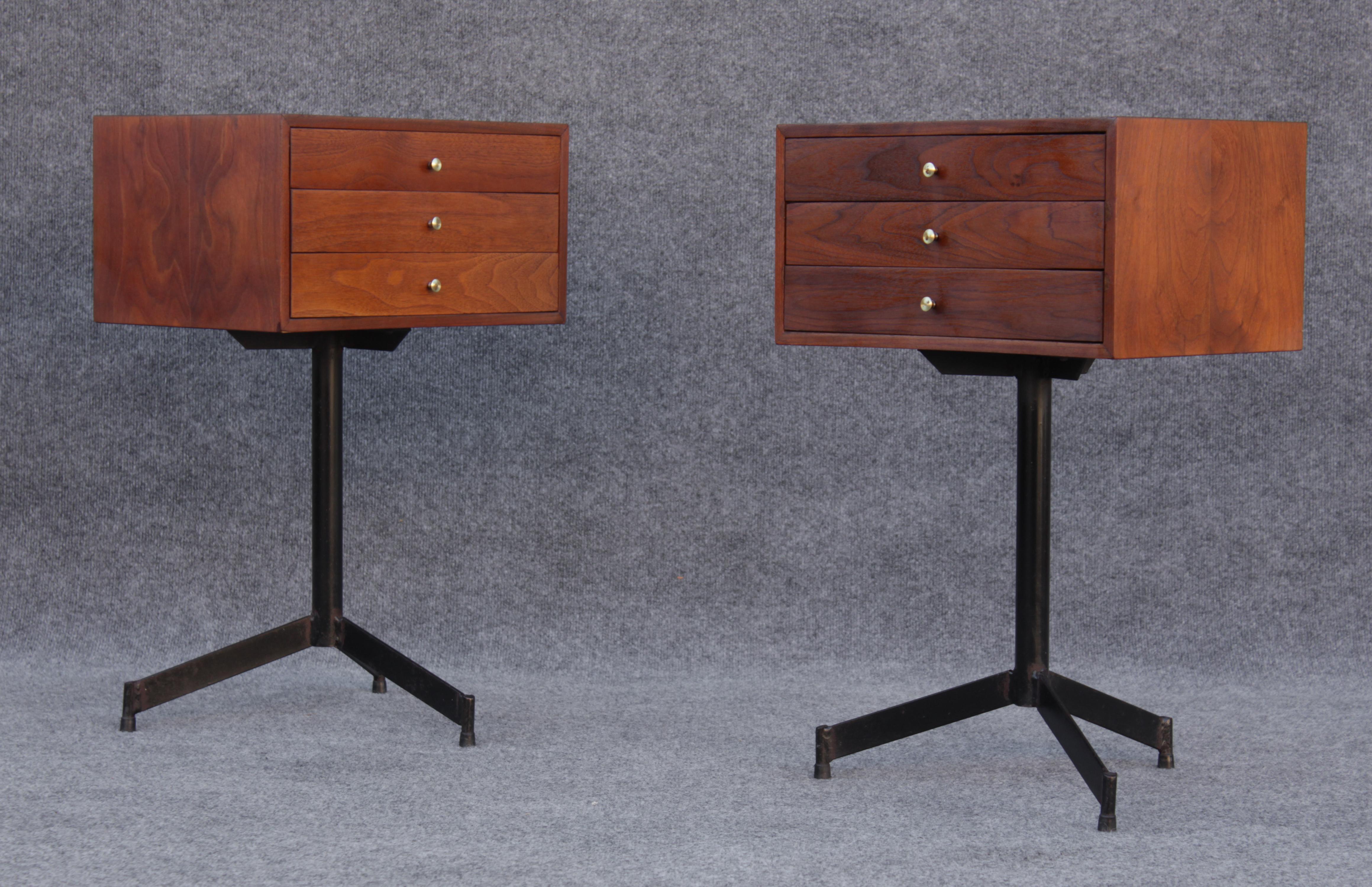Designed and made in the era of American Mid Century design, these feature a unique look and feel with their handsome 3-drawer walnut body and steel legs. The walnut bodies feature uniform edges around all four corners and brass pulls on each
