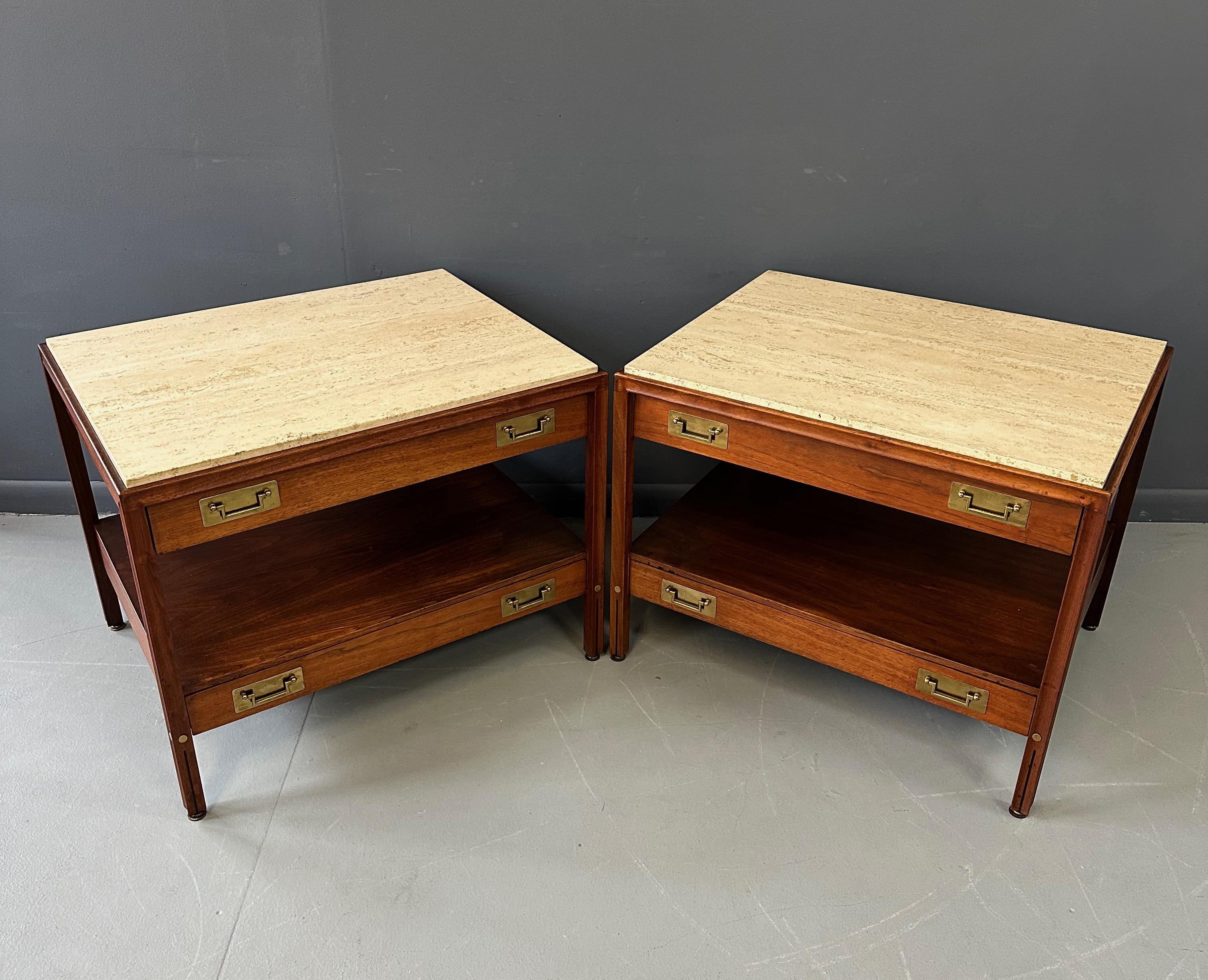 Impressive pair of walnut Nightstands with travertine tops and brass inserts and drawer pulls. These nightstands also have two generous drawers that are the width of the piece. The legs and trim have a lovely scalloped edge with a rosewood insert