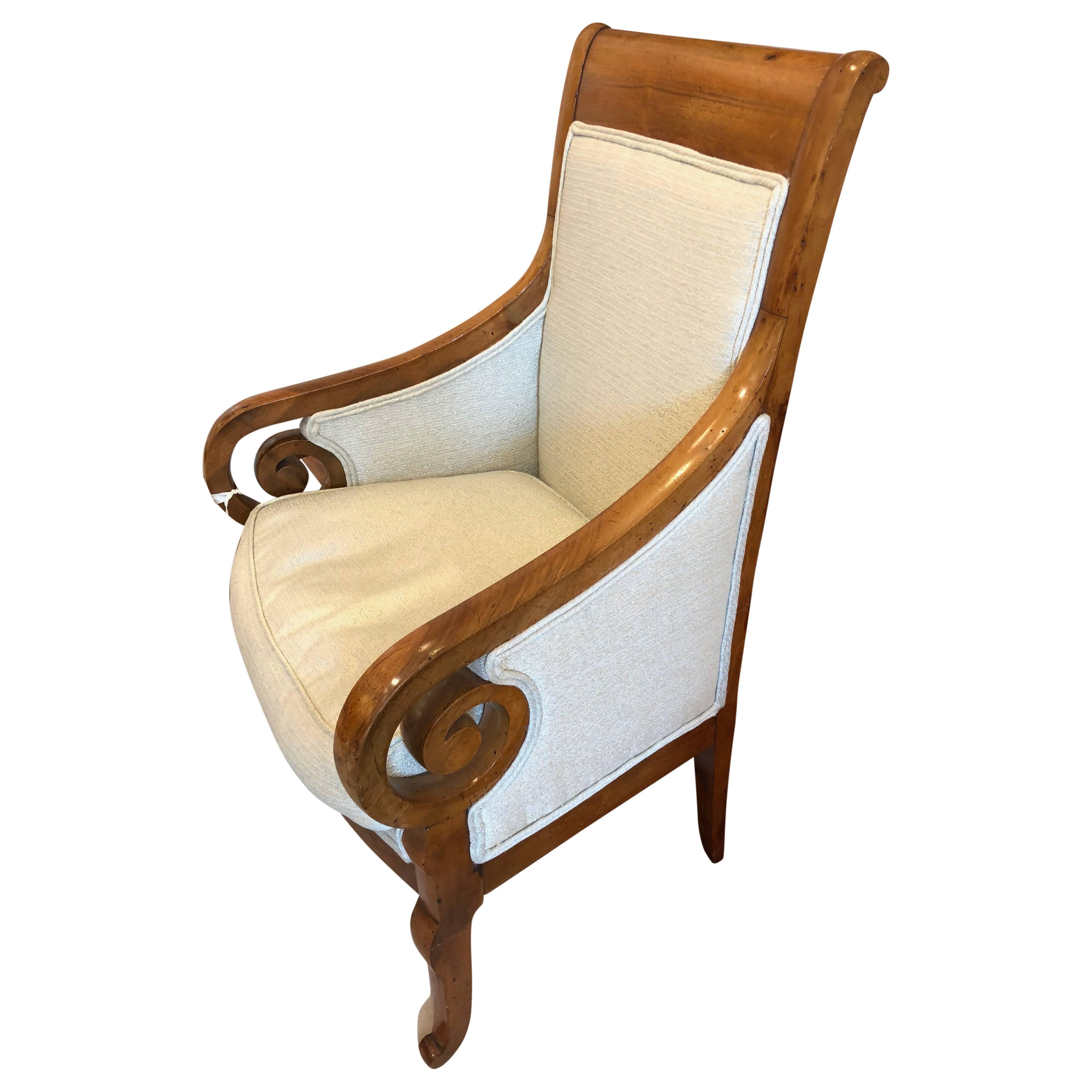 These antique midcentury walnut chairs are customized in a rich Nancy Corzine seafoam fabric. The scroll arms and unique backing make them a one of a kind set. Pair with the perfect cut velvet pillow and you have a Classic style mixed with a modern