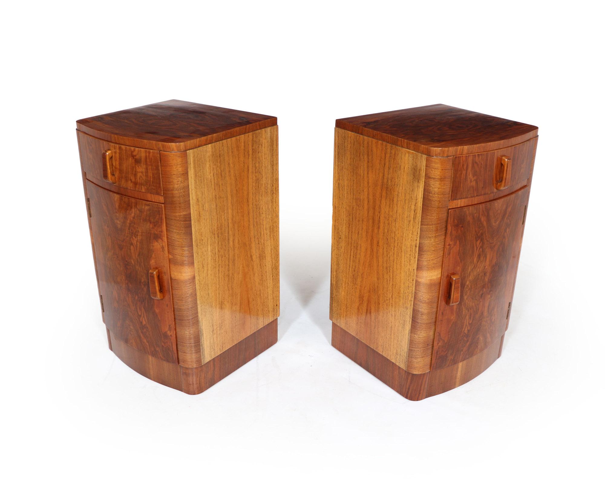 Pair of Walnut Art Deco bedside

Cabinets An opposite pair of bow fronted Art Deco bedside cabinets having single drawer above door with shelf behind, solid wood handles and curved corners, the cabinets has been restored where necessary and fully