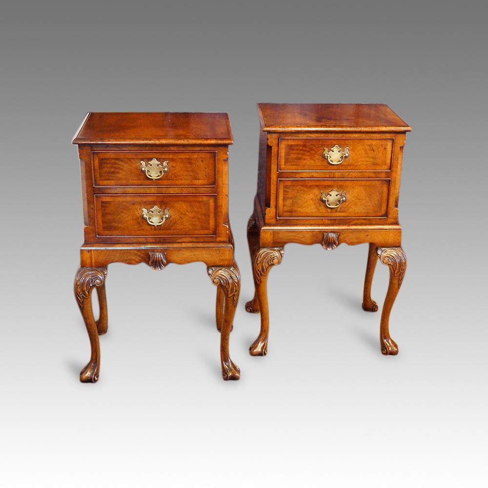 Pair of walnut bedside cabinets 

We are pleased to be offering you the opportunity to own this rare pair of walnut bedside cabinets that were made circa 1930.
Each of these elegant bedside cabinets are fitted a pair of crossbanded drawers fitted
