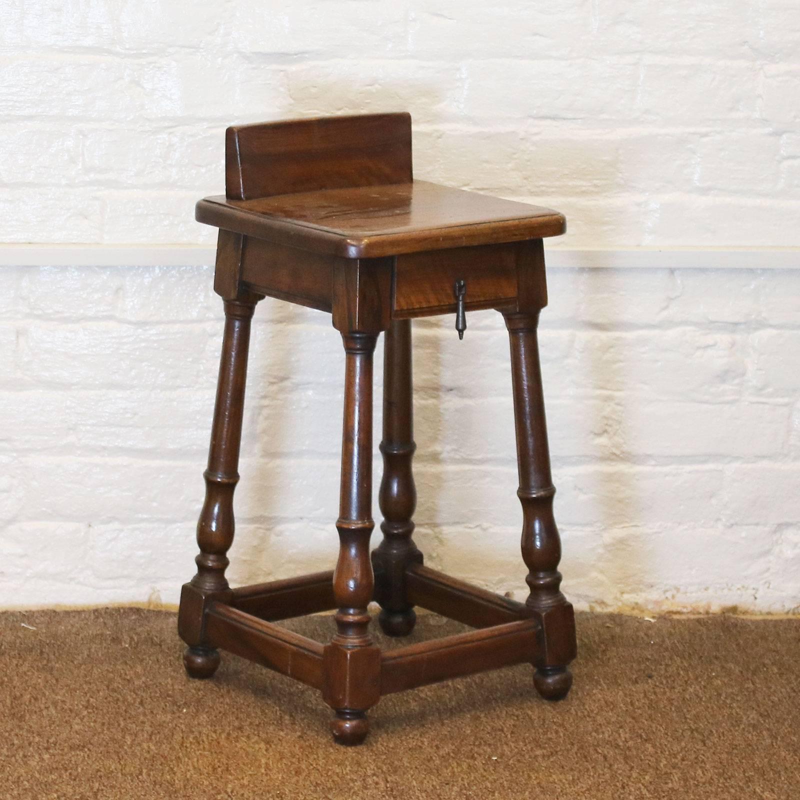 Matching pair of rustic style bedside tables in Walnut with a single working drawer.
