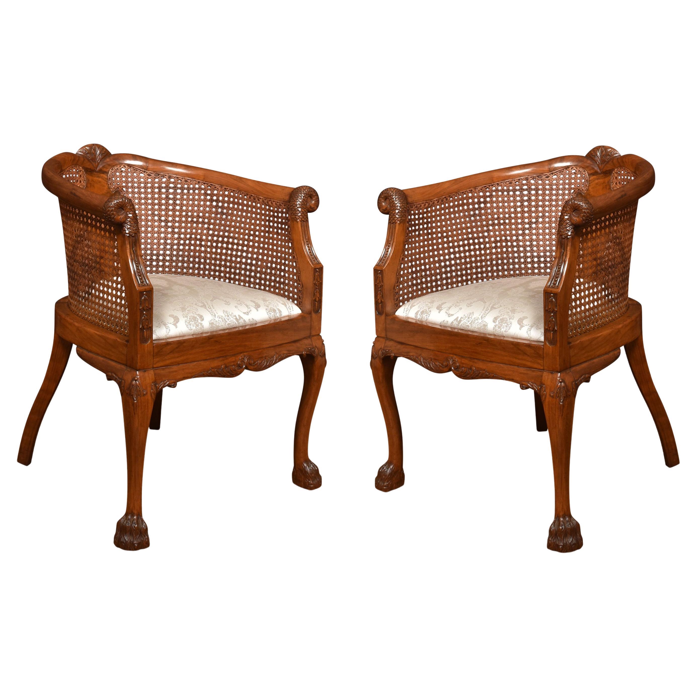 Pair of Walnut bergere arm chairs
